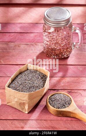 Poppy seeds in water - Papaver somniferum Stock Photo