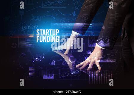 Businessman touching huge screen concept Stock Photo