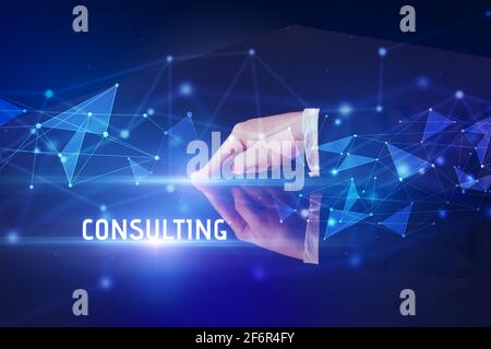 Businessman touching huge screen concept Stock Photo