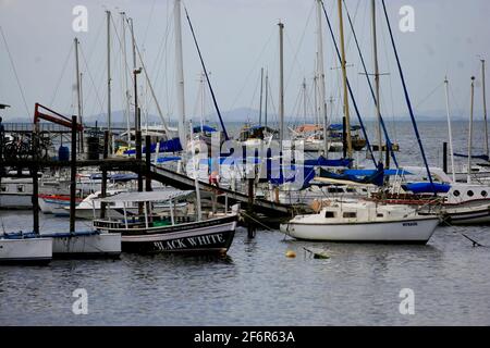 salvador, bahia / brazil - january 5, 2017: boats are seen anchored at the pier in the Ribeira neighborhood in the city of Salvador. *** Local Caption Stock Photo