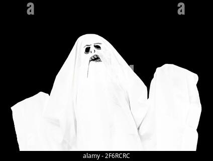 White ghost spooky on a black night background. Stock Photo