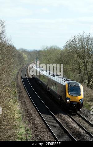 Cross Country Voyager diesel train at Hatton Bank, Warwickshire, England, UK Stock Photo