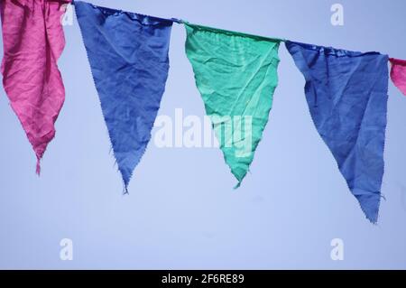 colorful pennants blue sky Stock Photo