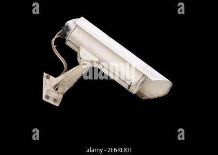 Security camera isolated on black background. Surveillance CCTV camera. Nobody Stock Photo