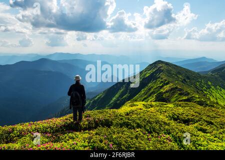 Man silhouette on foggy mountains. Travel concept. Landscape photography Stock Photo