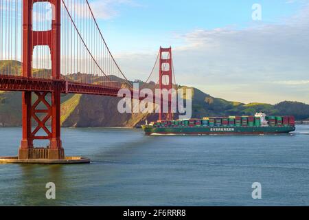 Container ship Ever Champion passes the Golden Gate Bridge in San Francisco, CA, USA, in March 2017. Stock Photo