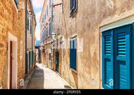 Narrow adriatic street in the Old Town of Herceg Novi, Montenegro.
