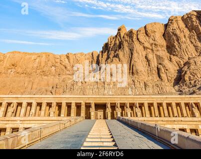 Ancient Hatshepsut Temple and blue morning sky in Luxor, Egypt.