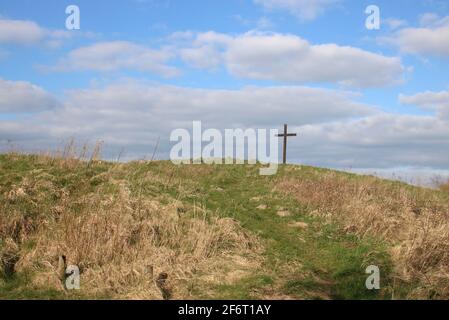 View of wooden cross on small hill at Easter, Good Friday 2021, erected at Lane Ends Amenity Area, Pilling, Lancashire by Pilling Churches together. Stock Photo