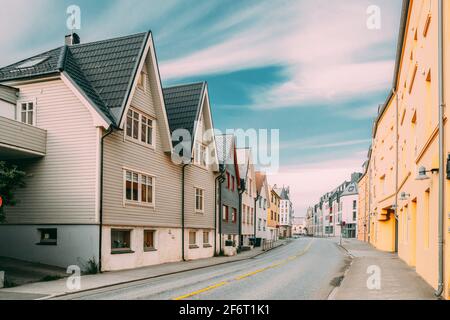 Alesund, Norway. Old Wooden Houses In Cloudy Summer Day.
