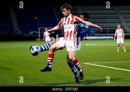 den bosch netherlands april 2 dhoraso moreo klas of fc den bosch and philippe rommens of top oss battle for possession during the keuken kampioen stock photo alamy