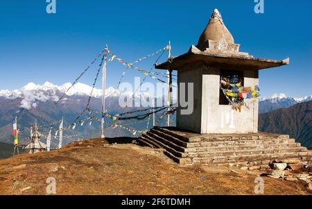 Panoramic view from Langtang to Ganesh Himal with stupa and prayer flags - Nepal Stock Photo