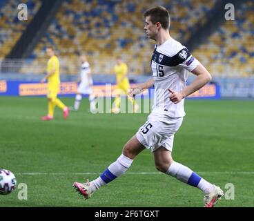 KYIV, UKRAINE - MARCH 28, 2021: Daniel O'Shaughnessy of Finland kicks a ball during the FIFA World Cup 2022 Qualifying round game against Ukraine at NSK Olimpiyskiy stadium in Kyiv Stock Photo