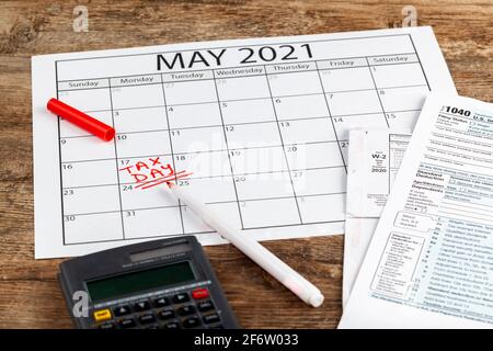 Internal Revenue Service (IRS) has extended the deadline for filing US federal income tax until May 17 2021. Concept image showing a calendar page mar Stock Photo