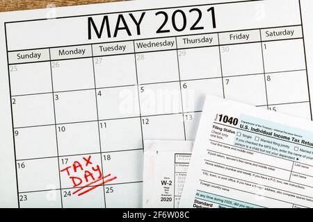 Internal Revenue Service (IRS) has extended the deadline for filing US federal income tax until May 17 2021. Concept image showing a calendar page mar Stock Photo