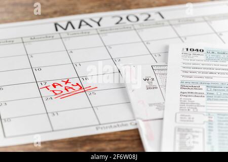 Internal Revenue Service (IRS) has extended the deadline for filing US federal income tax until May 17 2021. Concept image showing a calendar page mar Stock Photo