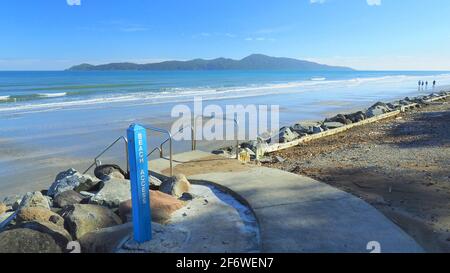 Kapiti Island from Raumati beach at low tide Stock Photo