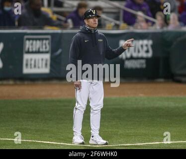 Vanderbilt head coach Tim Corbin high fives utility Jack Bulger as Bulger  rounds third base after hitting a home run during an NCAA regionals  championship baseball game against New Mexico State on