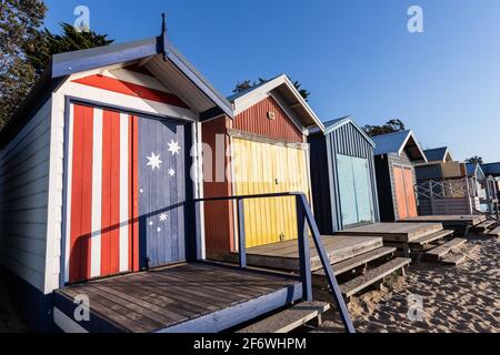 Beach boxes at Mornington Mills Beach on the Mornington Peninsula, a famous tourist attraction Stock Photo