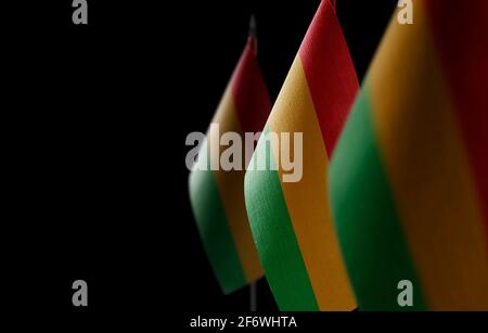 Small national flags of the Bolivia on a black background Stock Photo