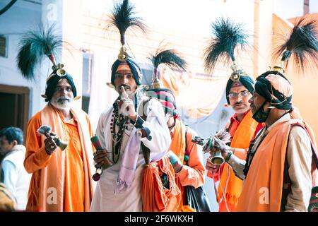 The Jangam or Jangama are a Shaiva order of religious monks. They are the priests or gurus of the Hindu Shaiva. Jangamas are also gurus of Veershaiva' sect. Jangamas are disciples of Lord Shiva as mentioned in Basava Puranas. A visit of a jangam to a house is treated as the visit of Lord Shiva himself and the jangam shall be given good alms and the jangam blesses the natives. The Jangam is the wandering holy man in Virashaivism. The meaning of word Jangam is 'moving linga' and considered superioir to 'sthira linga'. Jangama is one who is endowed with true spirit of Agamic knowledge, and has sa Stock Photo