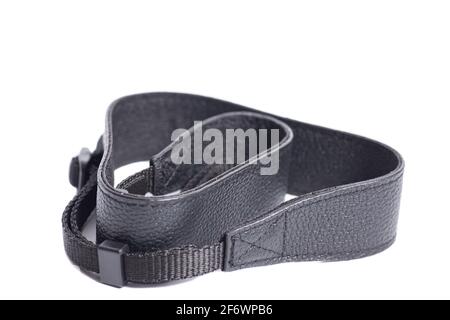 Black leather camera strap isolated on white background. Stock Photo
