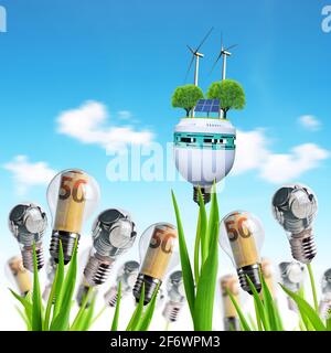 Light bulb with wind turbines,solar panel and coins on a plant. Concept of saving money. Alternative energy theme. Stock Photo