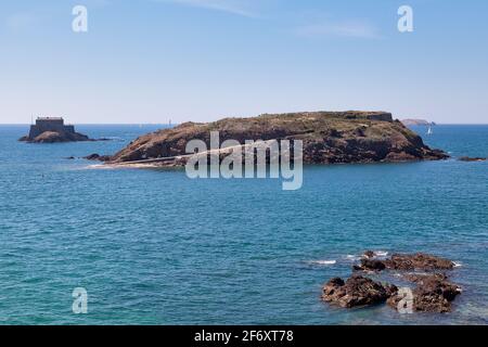 The Grand Bé and the Petit Bé are two rocky islands reachable by foot during low tide in Saint-Malo, Britany. Stock Photo