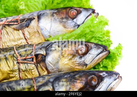 Appetizing smoked fish on a platter Stock Photo