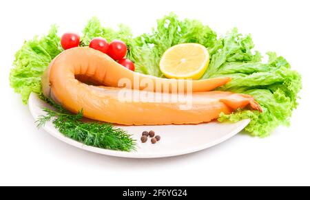 Smoked giant squid, a piece on a plate Stock Photo