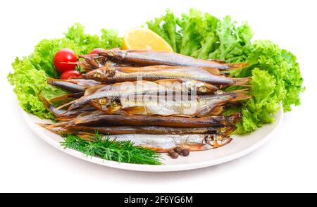 Dried smoked capelin on a plate Stock Photo