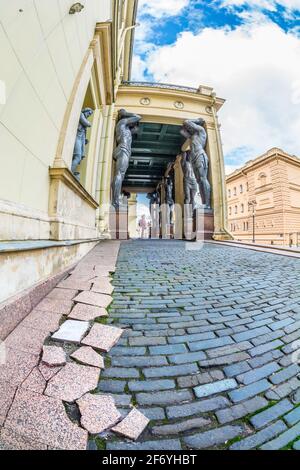 ST. PETERSBURG, RUSSIA - MAY 29, 2017: The portico of the New Hermitage is decorated with 10 figures of the Atlanteans by the sculptor A. I. Terebenev Stock Photo