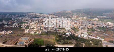 Masade Druze village houses in Israel northern Golan Heights, Aerial view. Stock Photo