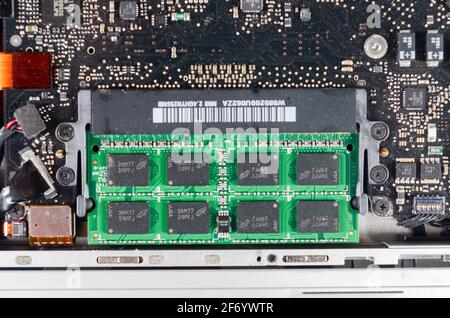 changing vintage macbook pro ram Stock Photo
