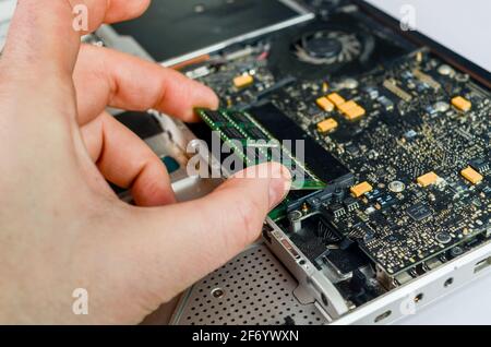 changing vintage macbook pro ram Stock Photo