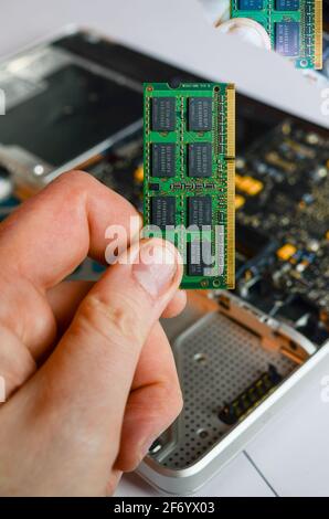 changing vintage macbook pro ram Stock Photo
