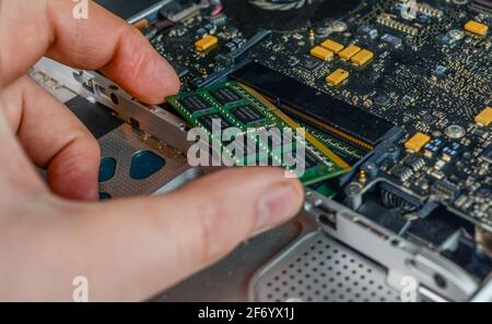 changing vintage macbook pro ram Stock Photo