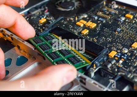 changing vintage macbook pro ram Stock Photo