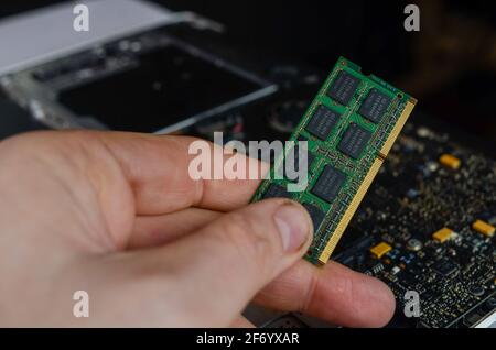 changing vintage macbook pro ram Stock Photo
