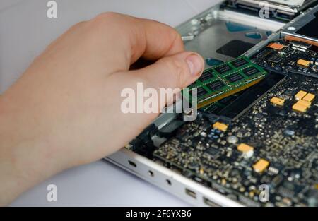 changing vintage macbook pro ram Stock Photo
