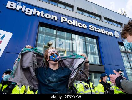 Brighton UK 3rd April 2021 - Hundreds of 'Kill The Bill' protesters gather outside Brighton Police Station in protest against the governments controversial new bill which would give police powers to crack down on peaceful protest  :  Credit Simon Dack / Alamy Live News Stock Photo