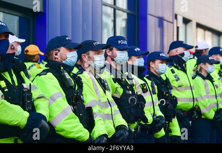 Brighton UK 3rd April 2021 - Police line up outside Brighton Police Station as hundreds of 'Kill The Bill' protesters take part in a protest against the governments controversial new bill which would give police powers to crack down on peaceful protest  :  Credit Simon Dack / Alamy Live News