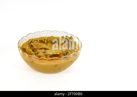 Kerala Sardine fish curry with mango and coconut in a glass bowl Stock Photo