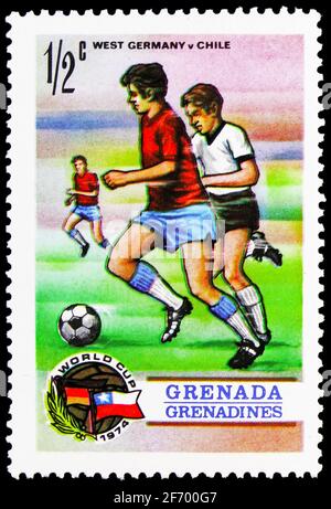 MOSCOW, RUSSIA - JANUARY 18, 2021: Postage stamp printed in Grenada Grenadines shows Germany - Chile, World Cup Soccer serie, circa 1974 Stock Photo