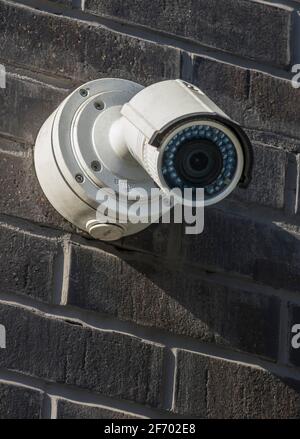 Security CCTV camera in office building Stock Photo