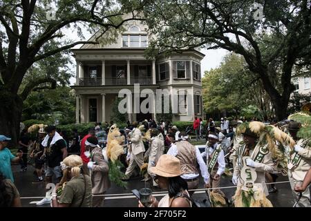 Young Men Olympians, New Orleans Social Aid and Pleasure Club Second Line (Secondline) Parade dancers on Second Line Sunday. New Orleans, Louisiana. Stock Photo