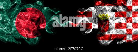 Bangladesh, Bangladeshi vs Germany, German, Bremen smoky mystic flags placed side by side. Thick colored silky abstract smokes flags. Stock Photo