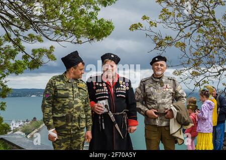 Kerch, Russia 05 09 2019 : Parade Victory Day. People participate in the patriotic action Immortal Regiment. They are holding portraits of people who Stock Photo