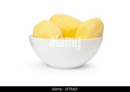 Peeled potatoes in a white bowl isolated on white background. With clipping path Stock Photo