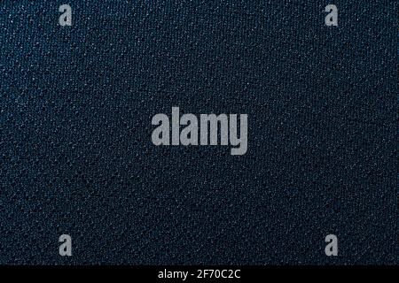 Polyester fabric background high-resolution texture in dark blue or teal Stock Photo